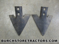 AC tractor cultivator sweeps