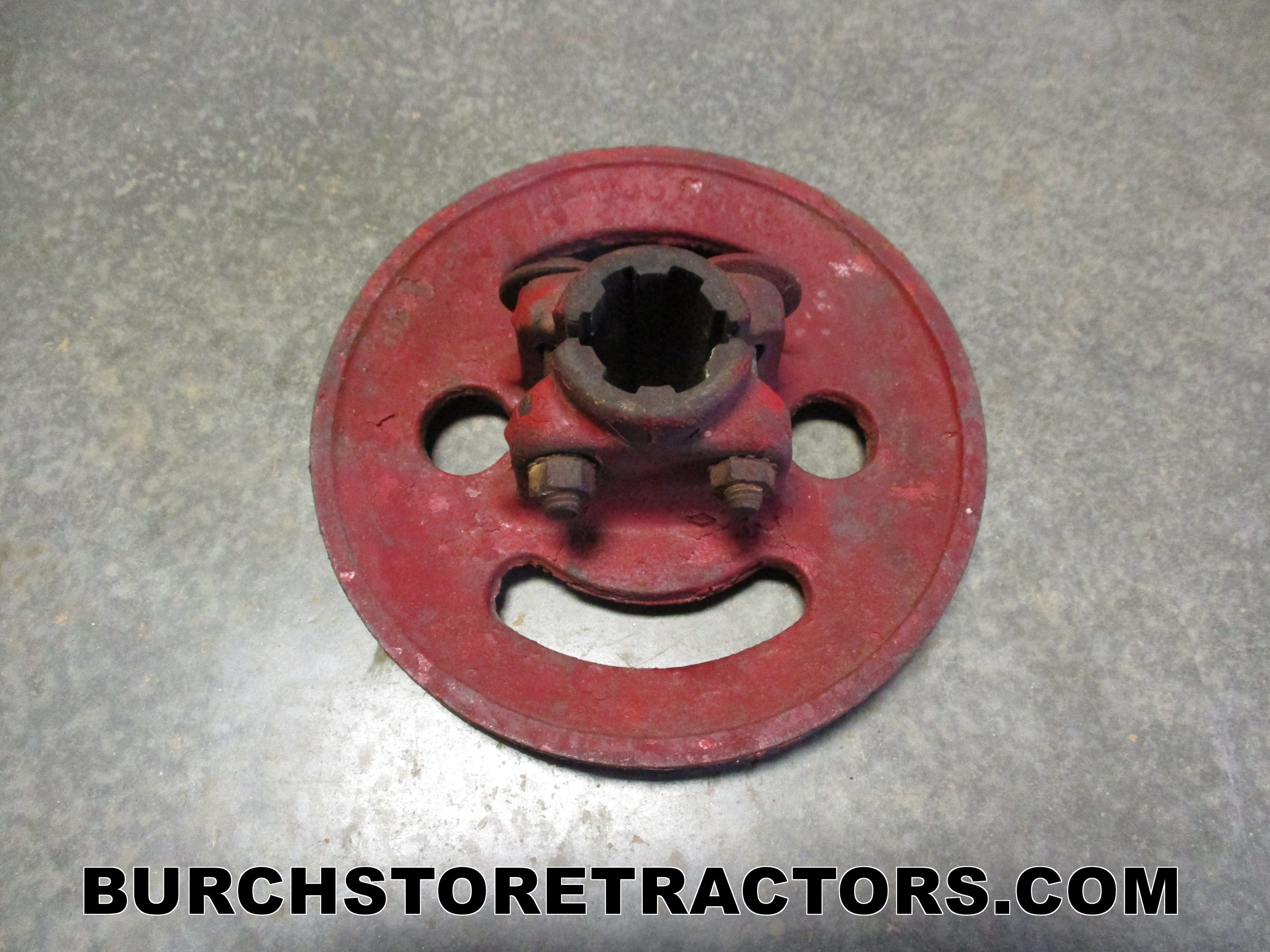 Mower drive pulley outlet